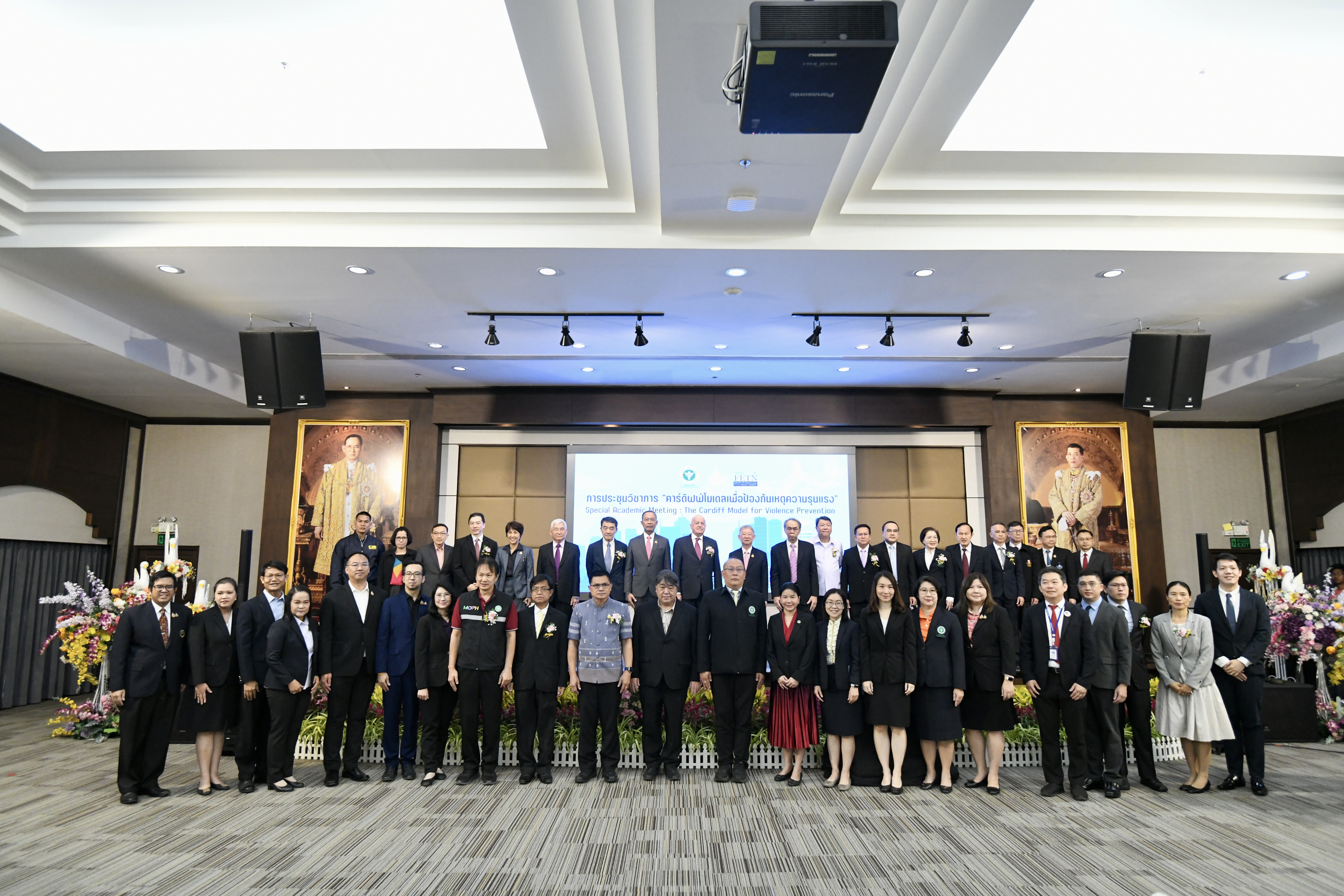 Hands holding a plant, symbolizing growth and support.